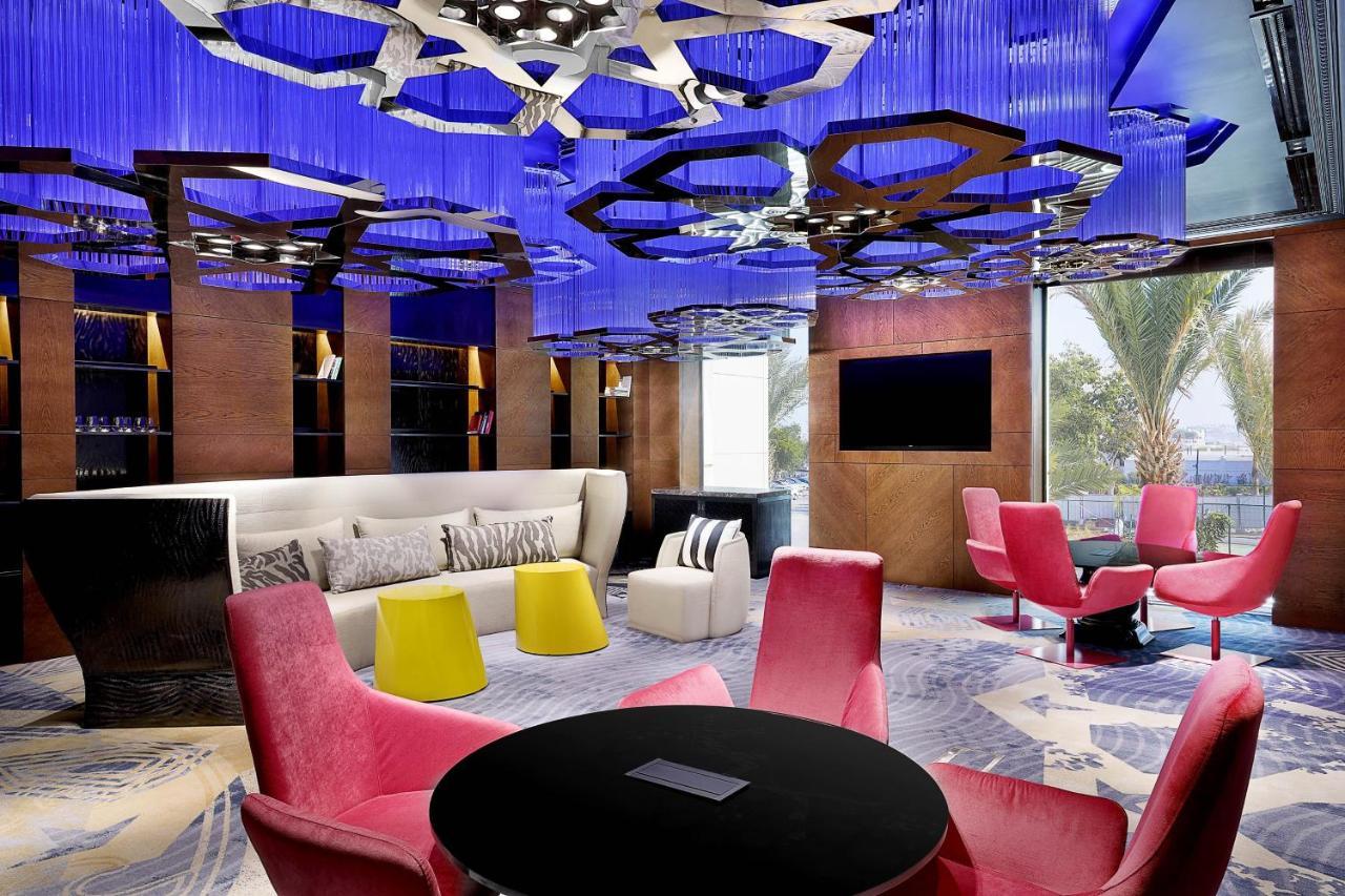 Отель W Маскат Экстерьер фото The W lounge at Beijing Capital International Airport